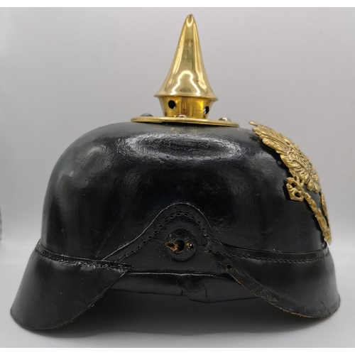 192 - A WWI Imperial German Prussian Pickelhaube. Leather & Brass mounted.