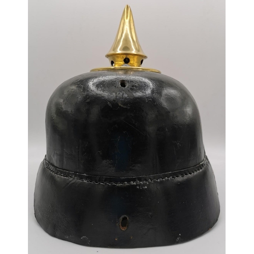 192 - A WWI Imperial German Prussian Pickelhaube. Leather & Brass mounted.