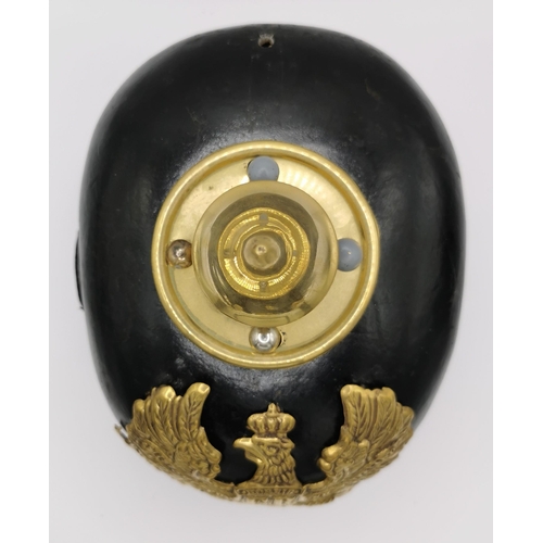 192 - A WWI Imperial German Prussian Pickelhaube. Leather & Brass mounted.