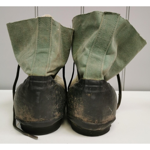 202 - A pair of vintage US military extreme cold boots. Boots appear to have been crudely reduced to ankle... 