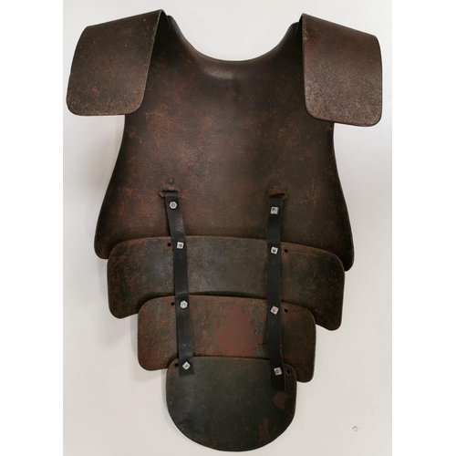 203 - A rare set of German WWI trench armour. Consists of a steel breast plate, with three additional inte... 