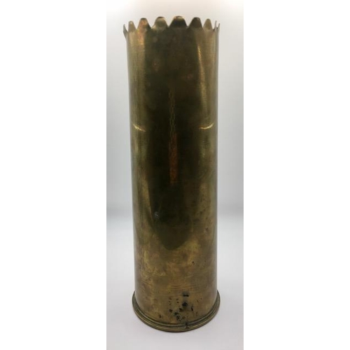 222 - Trench Art - A decorated WWI 1916 British brass shell case, to commemorate 'The Great War'. Length 2... 