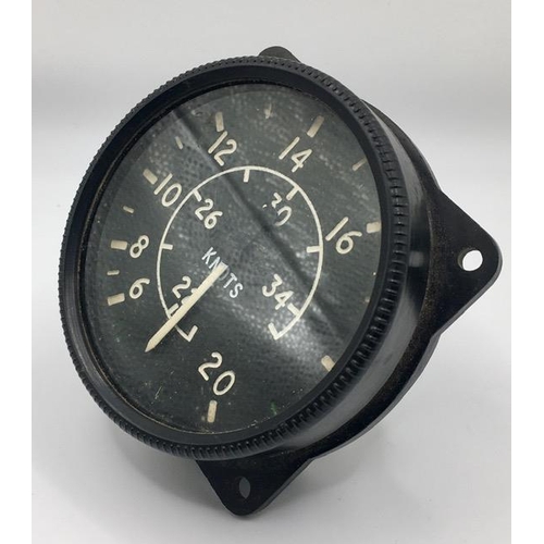 231 - A WWII Air Speed Indicator. Likely from a British Spitfire. No visible markings.