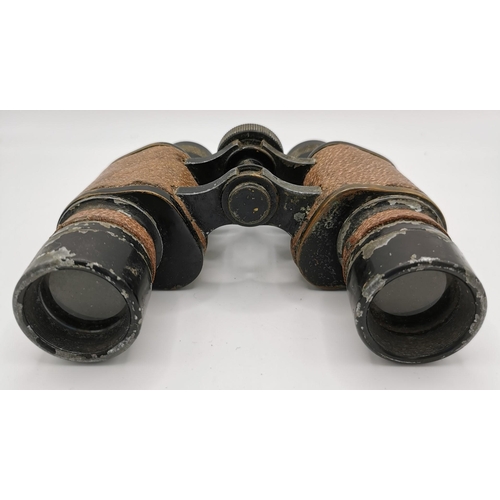 246 - A pair of leather-clad 10 x 30 WWII military binoculars, by 'Lumex'.