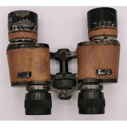 246 - A pair of leather-clad 10 x 30 WWII military binoculars, by 'Lumex'.