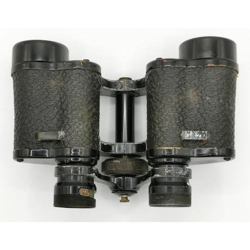 249 - A pair of WI-era 'Kenbar Deluxe' 8 x 30, French binoculars. Complete with leather carry case.