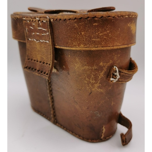 252 - A pair of WWI-era 'Ross of London' military binoculars, with original leather case.