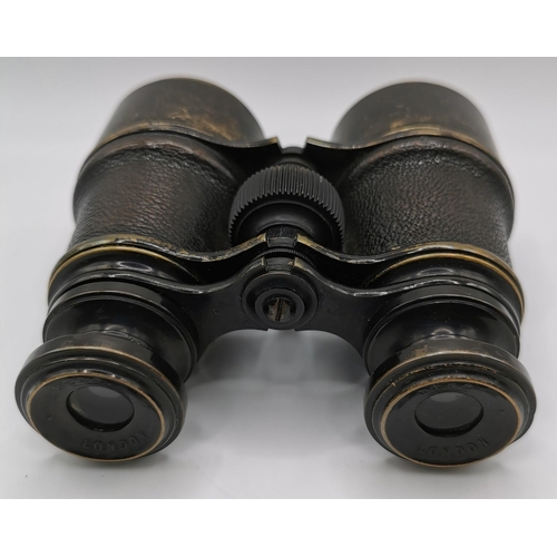 252 - A pair of WWI-era 'Ross of London' military binoculars, with original leather case.