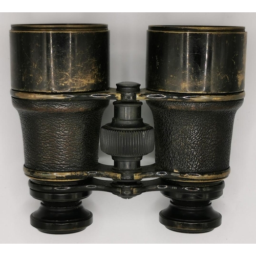 252 - A pair of WWI-era 'Ross of London' military binoculars, with original leather case.