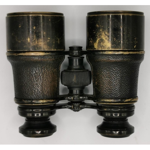 252 - A pair of WWI-era 'Ross of London' military binoculars, with original leather case.