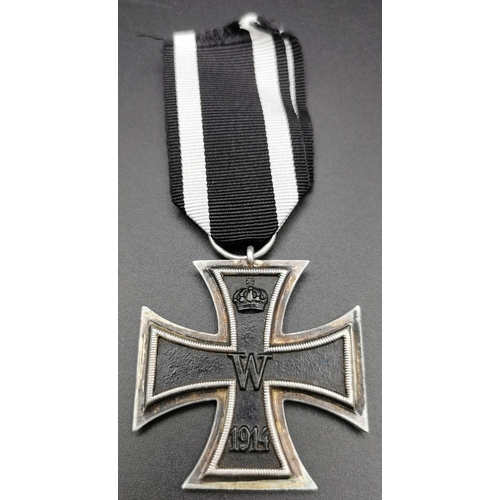 288 - An Imperial German WWI Iron Cross - Second Class. Complete with ribbon & (non-original) presentation... 