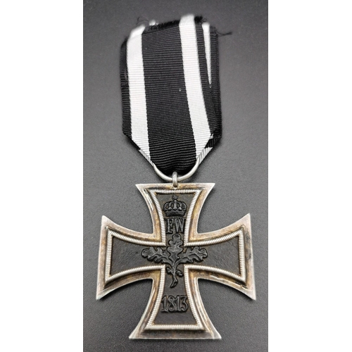 288 - An Imperial German WWI Iron Cross - Second Class. Complete with ribbon & (non-original) presentation... 