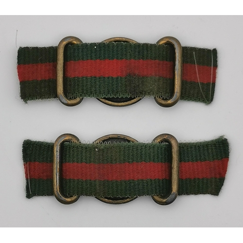 368 - A pair of British Artillery Regiment belt buckles, together with a Glider Regiment Pilot's beret bad... 