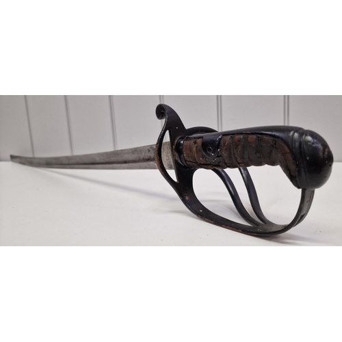 384 - An 1853 pattern Cavalry troopers sword & scabbard, with a 90cm curved single edged blade. Blade mark... 