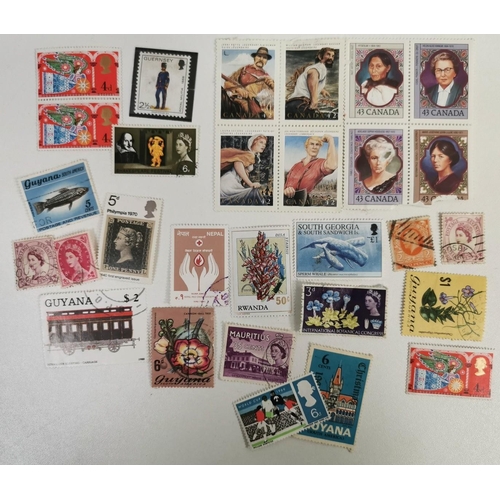 1641 - A mixed selection. To include five tea card albums, eight vintage postcards & a variety of stamps.