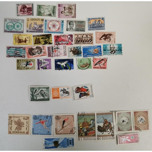 1641 - A mixed selection. To include five tea card albums, eight vintage postcards & a variety of stamps.