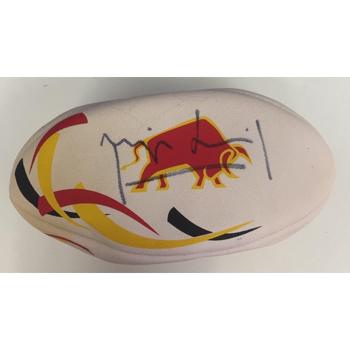 1748 - A signed 'Raging Bull' rugby ball, a pair of towels from 1984 Asian Rugby Football Tournament, anoth... 