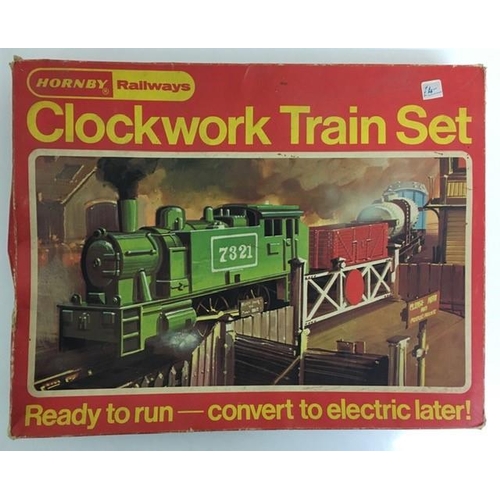 2751 - A boxed 'Hornby Clockwork Train Set'. Model no. RS692. Incomplete (missing track & keys).