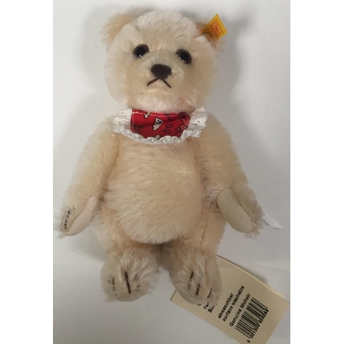 4006 - Steiffe 'Baby' bear. Fully jointed, mohair, with accompanying bib. Catalogue number 654589,. Height ... 