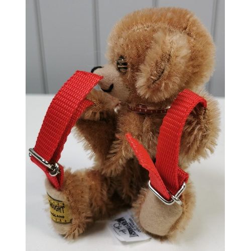 4041 - Merrythought 'Cheeky Back-Pack' bear. Brown mohair with accompanying ribbon & backpack. Catalogue no... 