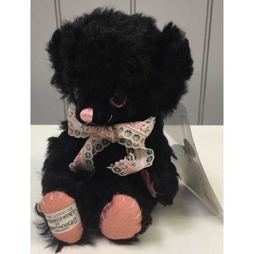 4052 - Merrythought 'Cheeky Marjorie' bear. Black mohair with accompanying lacy ribbon. Height 20cm. Catalo... 