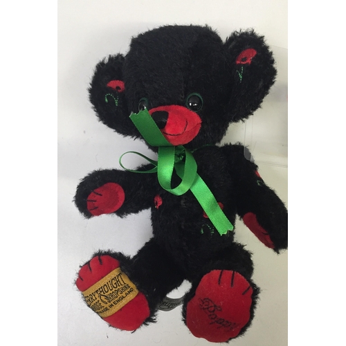 4055 - Merrythought 'Cheeky Little Poppy' bear. Black mohair with accompanying green ribbon. Catalogue no. ... 