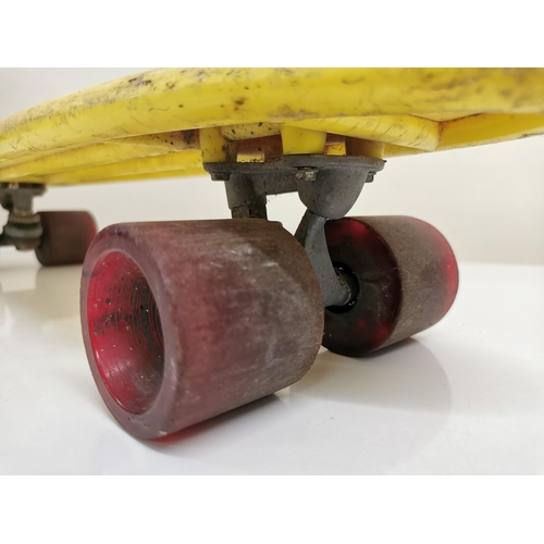 1827 - A vintage 1970's, yellow 'California Spirit' 'Pennyboard' skateboard.