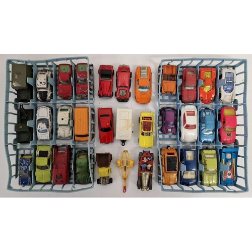 2212 - A collection of thirty-three playworn Corgi Juniors diecast vehicles, together with two carry-case t... 