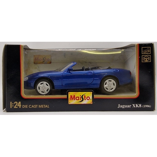 2173 - A collection of three boxed Maisto 1:24 scale  boxed cars. To include 1992 Jaguar Xj220, 1996 Jaguar... 