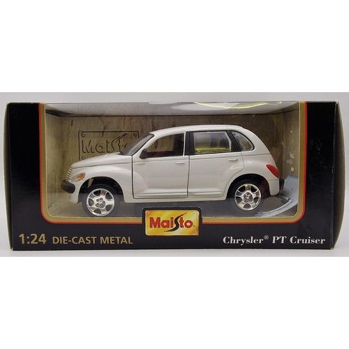 2173 - A collection of three boxed Maisto 1:24 scale  boxed cars. To include 1992 Jaguar Xj220, 1996 Jaguar... 