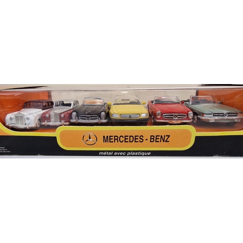 2159 - A collection of three Vitesse boxed models, together with a boxed set of Mercedes-Benz cars, by New ... 