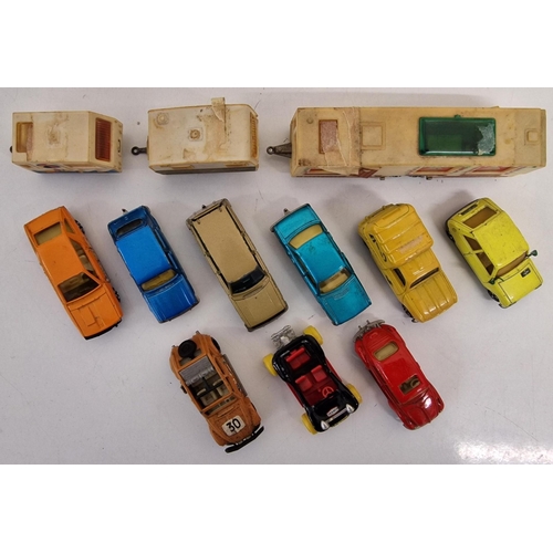 2165 - A collection of twelve playworn Majorette diecast vehicles.