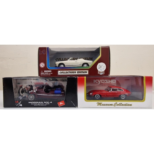 2166 - A collection of nine boxed diecast vehicles, by various manufacturers.