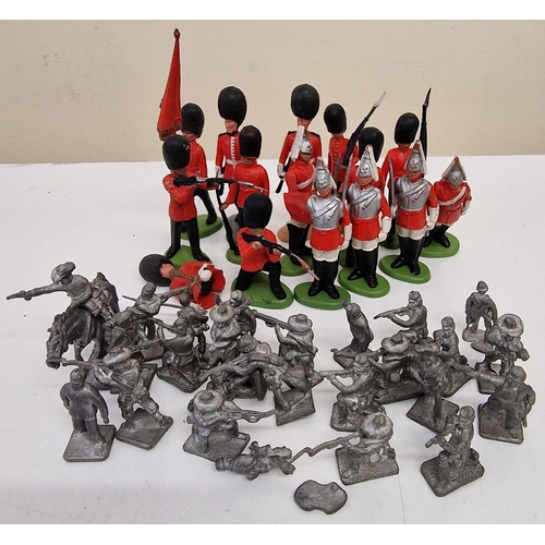 2172 - A massive collection of vintage, plastic toy soldiers & Cowboys & Indians.