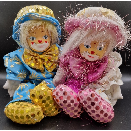 1815 - A pair of collectible 'Lucy's' clowns, with original presentation tins. Labels not present. Height 3... 