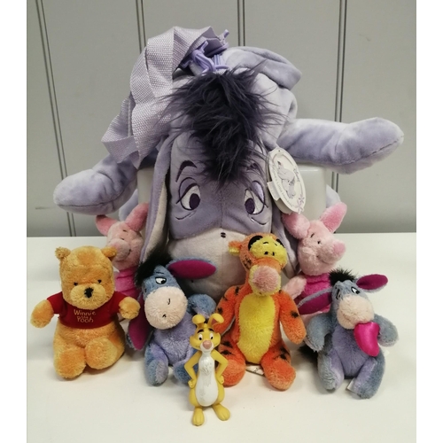 4081J - A large Eeyore soft rucksack, with adjustable backstraps & Disney Store tag, together with an Eeyore... 