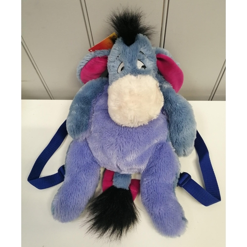 4081J - A large Eeyore soft rucksack, with adjustable backstraps & Disney Store tag, together with an Eeyore... 