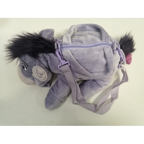 4081J - A large Eeyore soft rucksack, with adjustable backstraps & Disney Store tag, together with an Eeyore... 