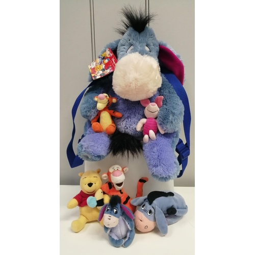 4081J - A large Eeyore soft rucksack, with adjustable backstraps & Disney Store tag, together with an Eeyore... 