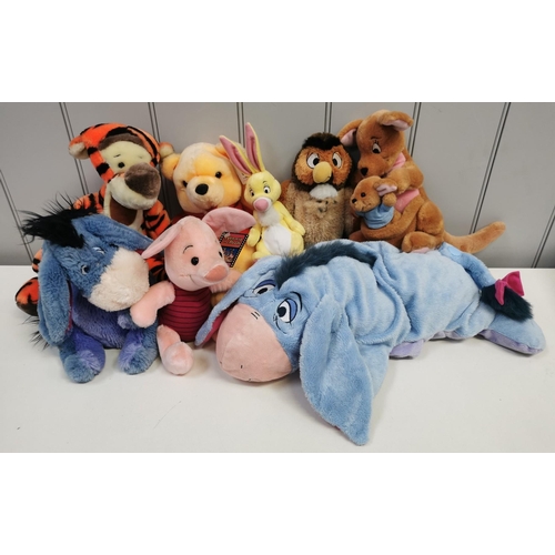 4081M - A collection of eight Winnie The Pooh toys, mostly by Disney Co. To include a Rabbit by Mattel & Eey... 