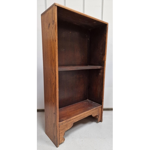 6 - A small, single-shelved, oak open bookcase. Dimensions(cm) H74, W42, D16.