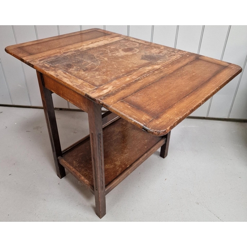 8 - An Edwardian oak, drop-leaf side table. Dimensions(cm) H68, W46/92, D60.