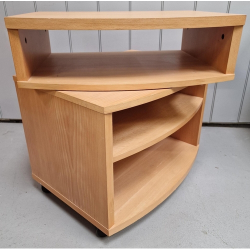 11 - A contemporary, beech-effect swivel-top TV/media stand. Dimensions(cm) H64, W60, D45.