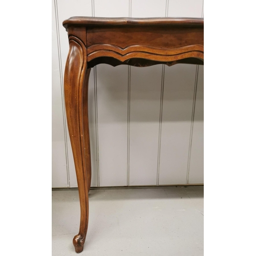 23 - A French Louis XV style, reproduction mahogany  console table. Dimensions(cm) H71, W136, D37.