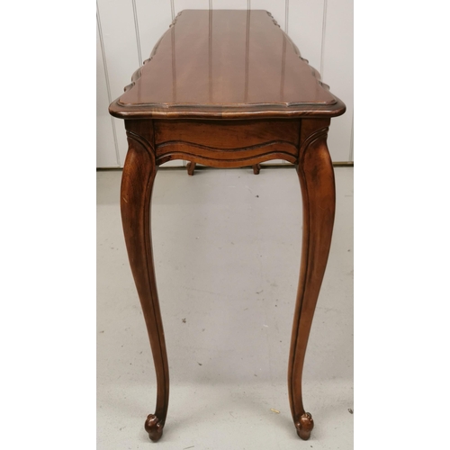 23 - A French Louis XV style, reproduction mahogany  console table. Dimensions(cm) H71, W136, D37.