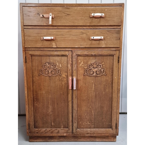 25 - A vintage tallboy, with double drawers over double-door cupboard. Dimensions(cm) H124, W84, D51.