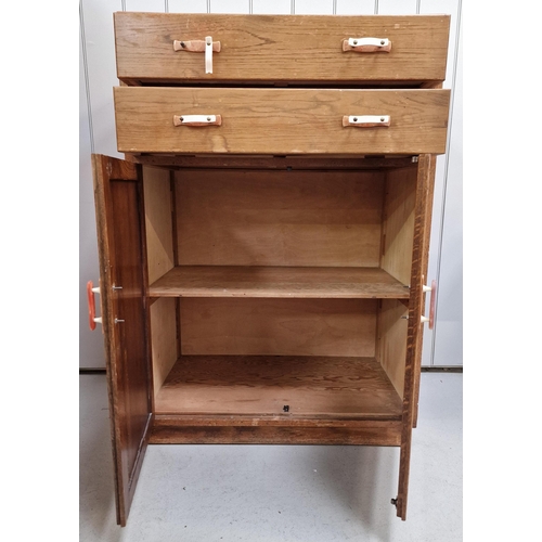 25 - A vintage tallboy, with double drawers over double-door cupboard. Dimensions(cm) H124, W84, D51.