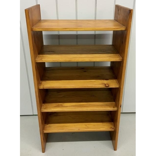 38 - A stained pine open bookcase, with five shelves. Dimensions(cm) H110, W60, D37.