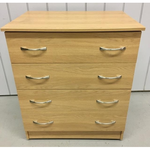 68 - A beech-coloured chest of four drawers with chrome coloured handles, on castors. Dimensions(cm) H85,... 