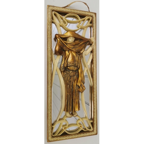 76 - A sculpted Art Nouveau wall mirror, by 'Oliver Tupton'. Dimensions(cm) H45, W19, D2.